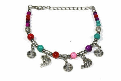 Turquoise Beaded Fish Charm Bracelet With Spiral Charms